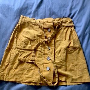 Size Large,Hesperus skirt, worn once, elastic waist band and tie, button front